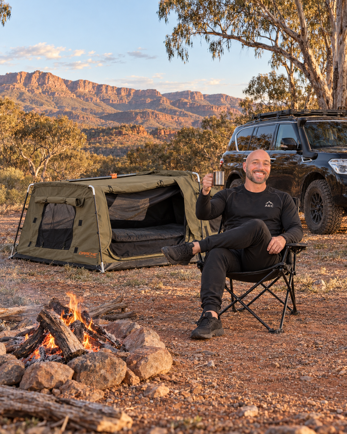 Leighton Calvert with a Darche Dirty Dee 1100 swag and black Y62 Patrol at Wilpena Pound