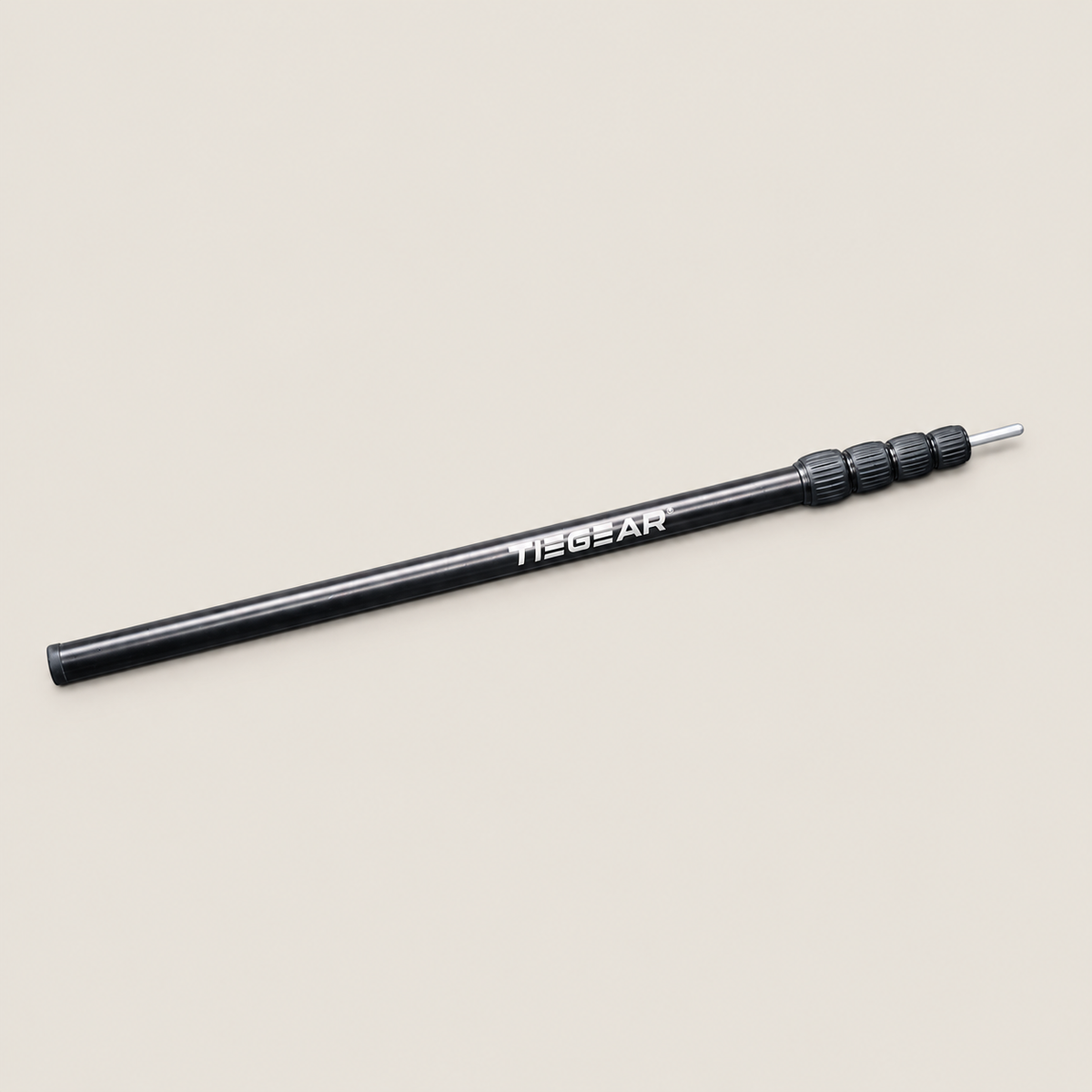 TIEGEAR AXIS POLE on warm stone background