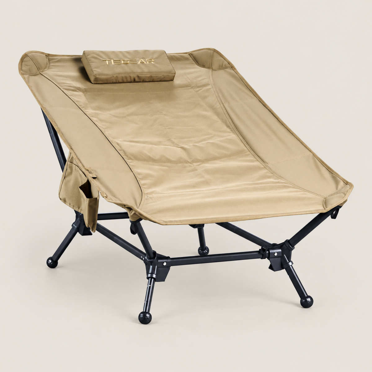 TIEGEAR BASE LOUNGER DESERT on warm stone background