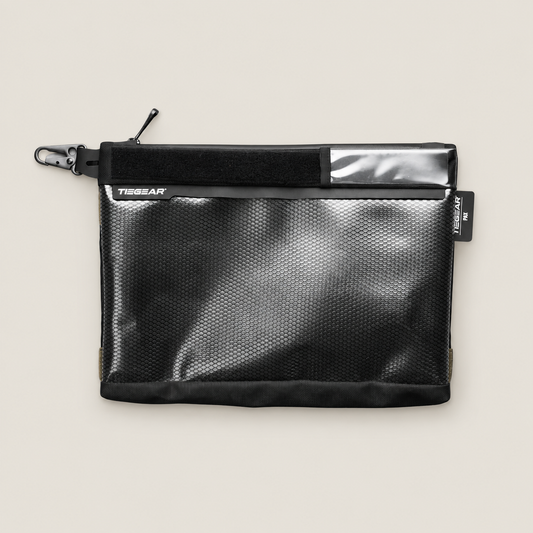 TIEGEAR PAX UTILITY L on warm stone background